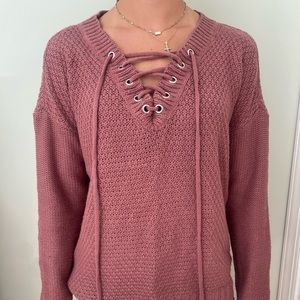 Barely worn tie up sweater from Rue21. Size xs, loose fitting, very comfortable!
